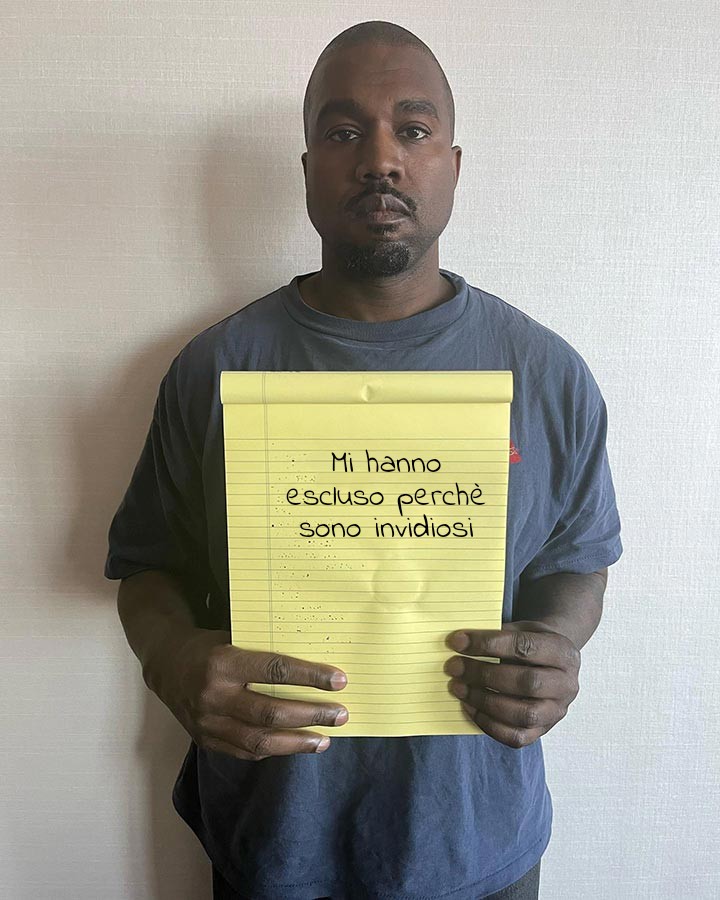 Kanye West Holding Notepad 12072022193220.jpg